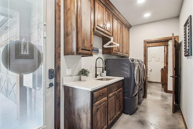5813 Tiger Stone Dr, Mustang, OK 73064 - laundry room featuring cabinet space, washer and dryer, baseboards, and recessed lighting