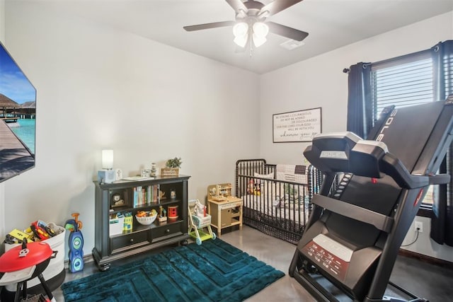 5813 Tiger Stone Dr, Mustang, OK 73064 - exercise room featuring a ceiling fan
