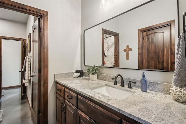 5813 Tiger Stone Dr, Mustang, OK 73064 - bathroom featuring finished concrete floors and vanity