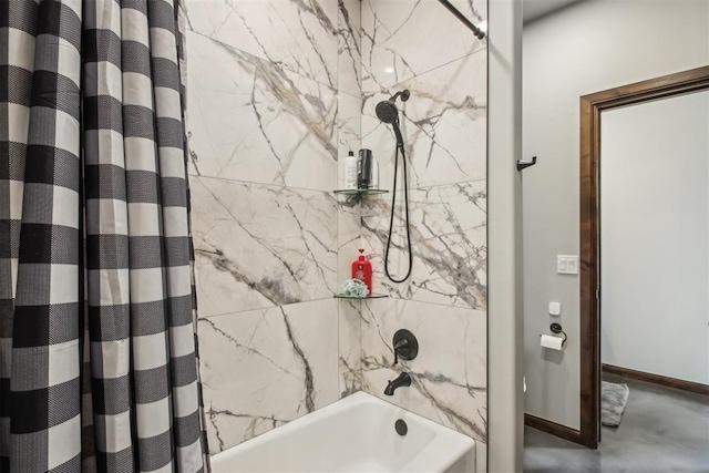 5813 Tiger Stone Dr, Mustang, OK 73064 - full bath featuring shower / bath combo, concrete floors, and baseboards