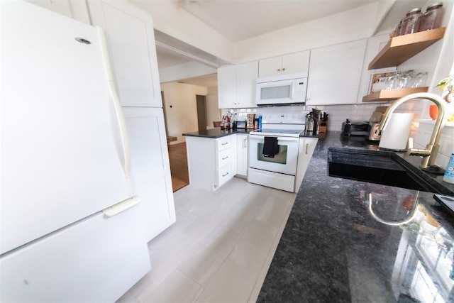 2616 NW 33rd St, Oklahoma City, OK 73112 - kitchen with white appliances, a sink, open shelves, and white cabinets