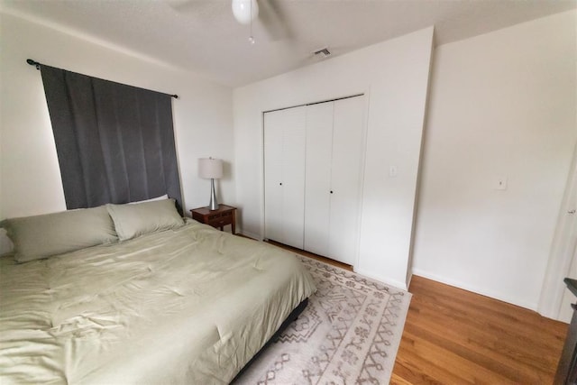 2616 NW 33rd St, Oklahoma City, OK 73112 - bedroom with light wood-type flooring, a closet, and ceiling fan