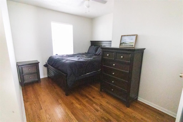 2616 NW 33rd St, Oklahoma City, OK 73112 - bedroom with dark wood-style floors, baseboards, and ceiling fan