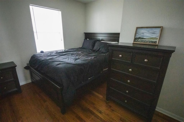 2616 NW 33rd St, Oklahoma City, OK 73112 - bedroom featuring dark wood-style floors and baseboards