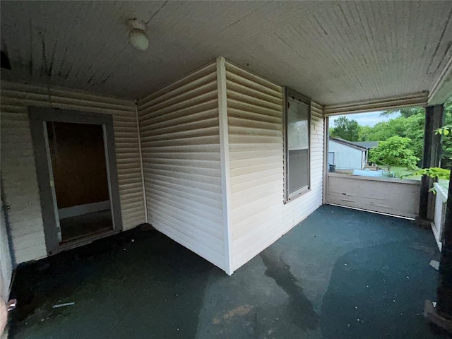 8312 Spencer Jones Rd, Jones, OK 73049 - view of patio with an attached carport