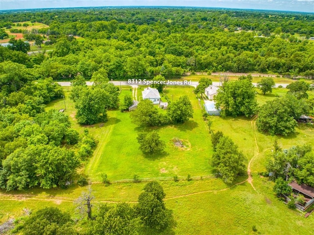 8312 Spencer Jones Rd, Jones, OK 73049 - aerial view of a heavily wooded area