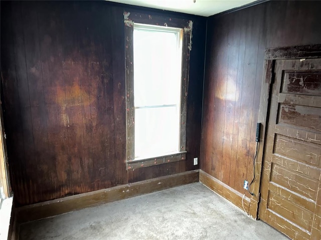8312 Spencer Jones Rd, Jones, OK 73049 - spare room with baseboards and wooden walls
