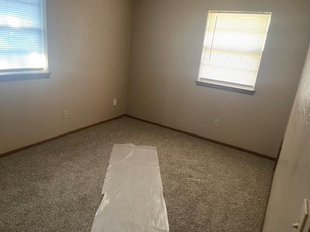 7716 S Charlotte Dr, Oklahoma City, OK 73159 - spare room with carpet floors and baseboards