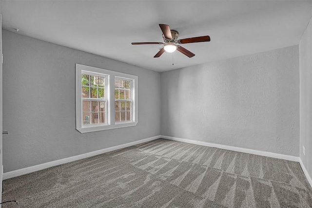 1016 E Cypress St, Altus, OK 73521 - carpeted empty room with a ceiling fan, a textured wall, and baseboards