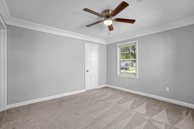 1016 E Cypress St, Altus, OK 73521 - carpeted spare room with crown molding, a ceiling fan, and baseboards
