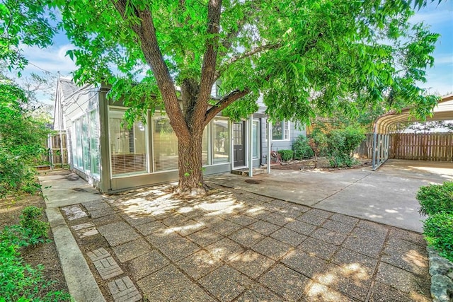 1016 E Cypress St, Altus, OK 73521 - rear view of property featuring a patio area