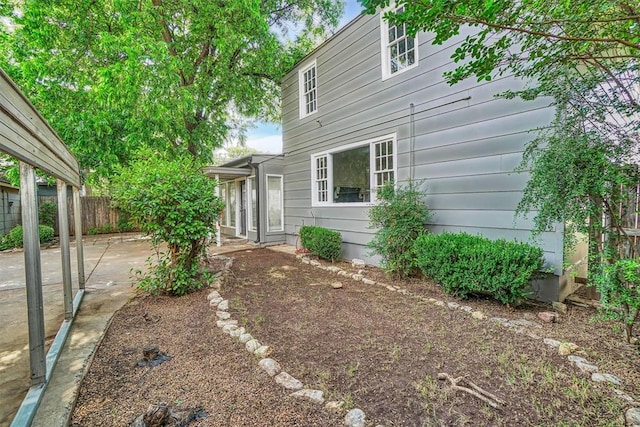 1016 E Cypress St, Altus, OK 73521 - rear view of property with a patio area