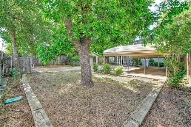 1016 E Cypress St, Altus, OK 73521 - fenced backyard featuring a patio area