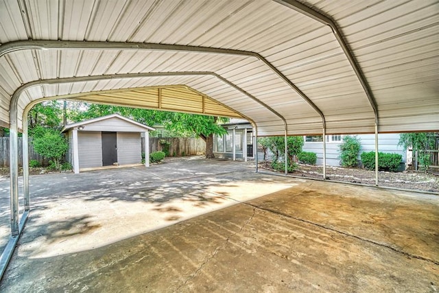 1016 E Cypress St, Altus, OK 73521 - garage featuring a detached carport