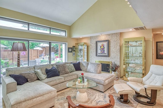3605 Hampton Ct, Norman, OK 73072 - living room with high vaulted ceiling and a fireplace