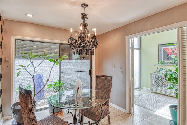3605 Hampton Ct, Norman, OK 73072 - dining room featuring a chandelier, baseboards, light tile patterned floors, and recessed lighting