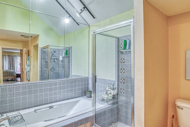 3605 Hampton Ct, Norman, OK 73072 - bathroom featuring a stall shower, a bath, toilet, and vaulted ceiling