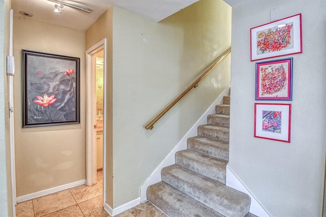 3605 Hampton Ct, Norman, OK 73072 - stairs featuring baseboards and tile patterned floors