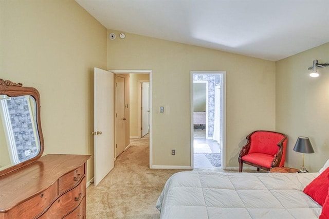 3605 Hampton Ct, Norman, OK 73072 - bedroom with vaulted ceiling, light carpet, and baseboards