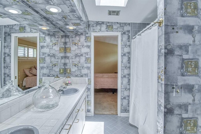 3605 Hampton Ct, Norman, OK 73072 - full bathroom featuring connected bathroom, tile patterned flooring, and double vanity