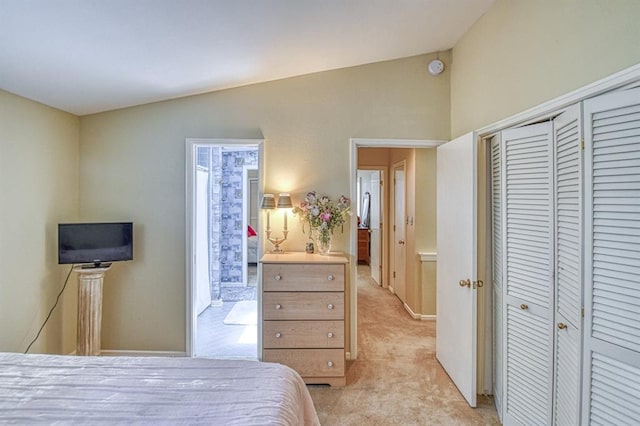 3605 Hampton Ct, Norman, OK 73072 - bedroom with lofted ceiling, light carpet, and a closet
