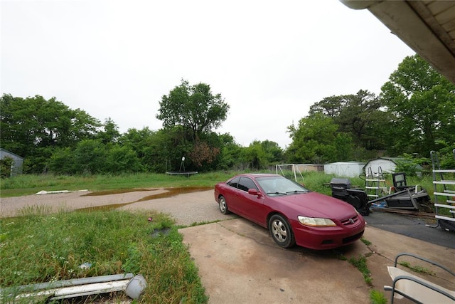 view of parking / parking lot