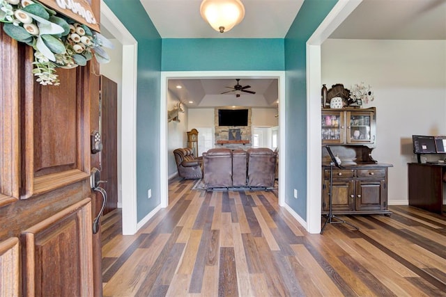13131 SW 15th St, Yukon, OK 73099 - foyer entrance featuring a ceiling fan, wood finished floors, and baseboards
