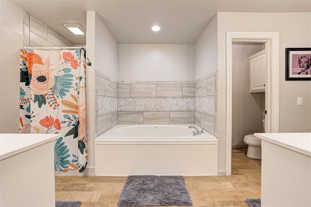 13131 SW 15th St, Yukon, OK 73099 - bathroom featuring toilet, vanity, a bath, wood finished floors, and curtained shower