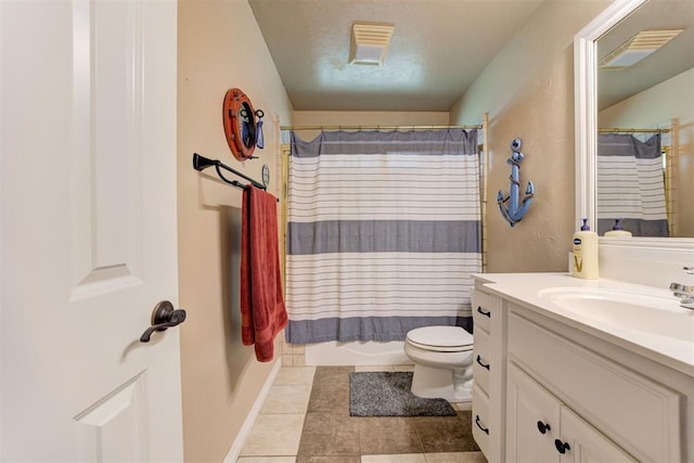13131 SW 15th St, Yukon, OK 73099 - full bathroom with vanity, toilet, tile patterned flooring, and baseboards