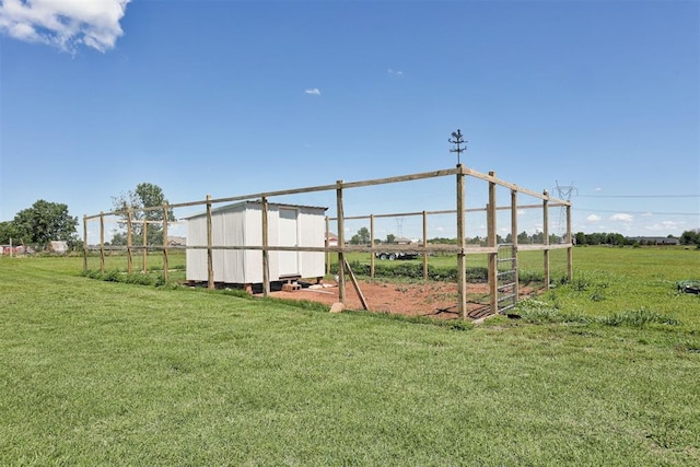 13131 SW 15th St, Yukon, OK 73099 - view of grassy yard featuring exterior structure and an outbuilding