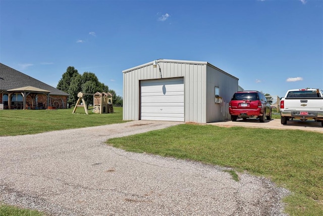 13131 SW 15th St, Yukon, OK 73099 - detached garage featuring driveway