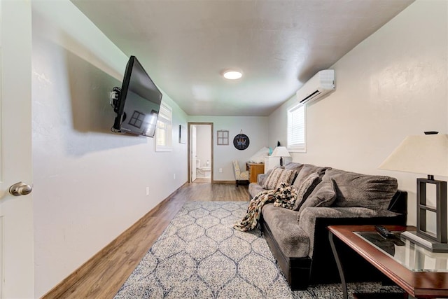 13131 SW 15th St, Yukon, OK 73099 - living area featuring a wall unit AC and wood finished floors