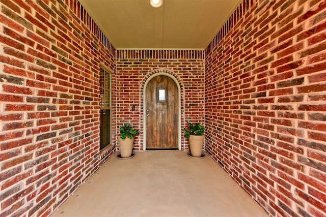 1440 Station St, Edmond, OK 73034 - property entrance featuring brick siding
