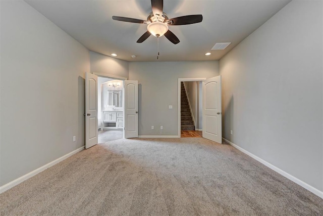 1440 Station St, Edmond, OK 73034 - unfurnished bedroom featuring carpet flooring, ensuite bath, recessed lighting, baseboards, and ceiling fan
