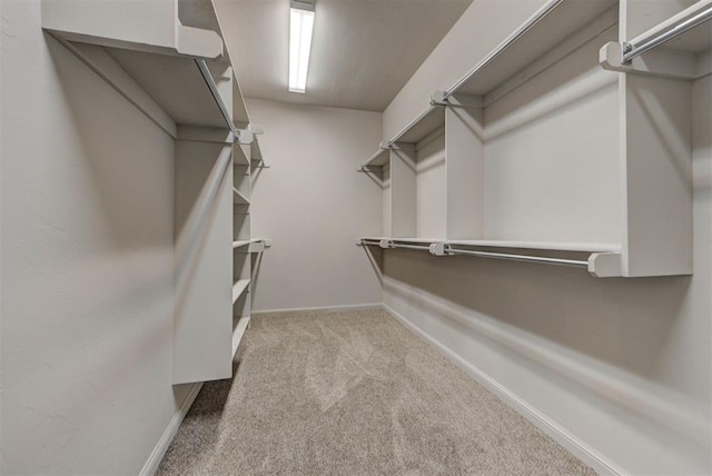 1440 Station St, Edmond, OK 73034 - spacious closet featuring carpet