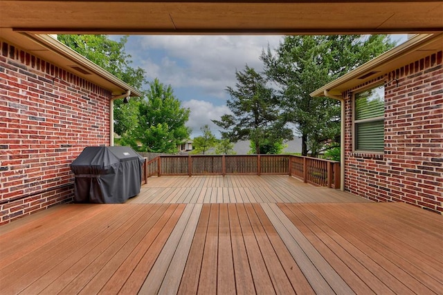 1440 Station St, Edmond, OK 73034 - wooden terrace featuring area for grilling