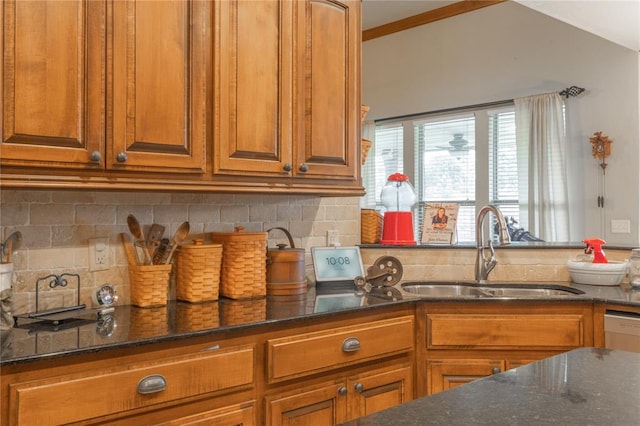 13605 Verona Strada, Oklahoma City, OK 73170 - kitchen with a sink, brown cabinets, tasteful backsplash, dark stone countertops, and dishwashing machine