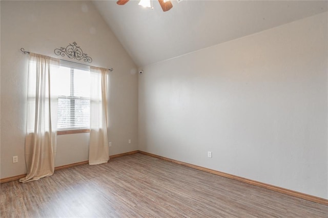 13605 Verona Strada, Oklahoma City, OK 73170 - spare room with wood finished floors, ceiling fan, and vaulted ceiling
