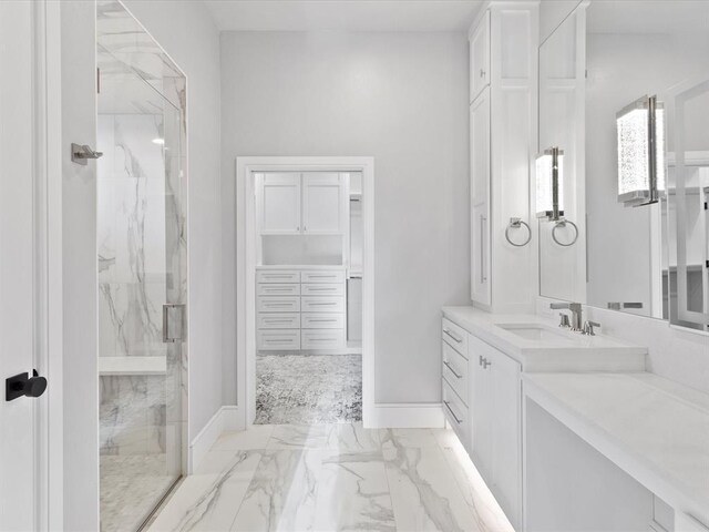 12901 Rivendell Dr, Oklahoma City, OK 73170 - full bathroom featuring a marble finish shower, marble finish flooring, vanity, baseboards, and a walk in closet
