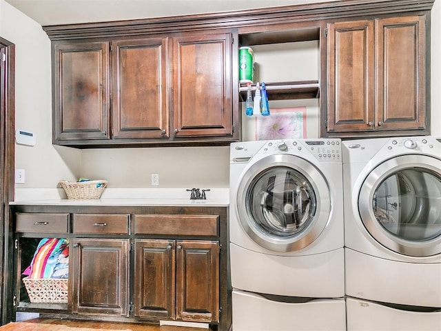 15228 Turtle Lake Pl, Oklahoma City, OK 73165 - laundry area with cabinet space and washer and dryer