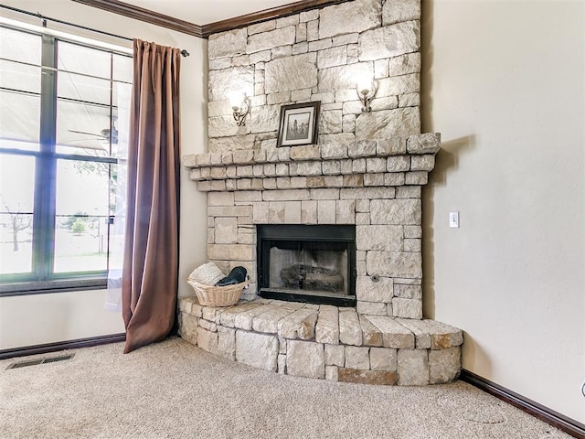 15228 Turtle Lake Pl, Oklahoma City, OK 73165 - detailed view of carpet, a stone fireplace, baseboards, and ornamental molding