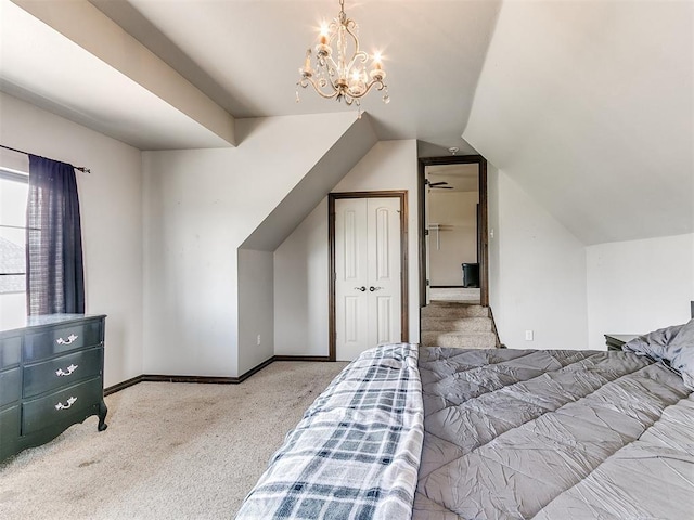 15228 Turtle Lake Pl, Oklahoma City, OK 73165 - carpeted bedroom with baseboards, lofted ceiling, and a chandelier