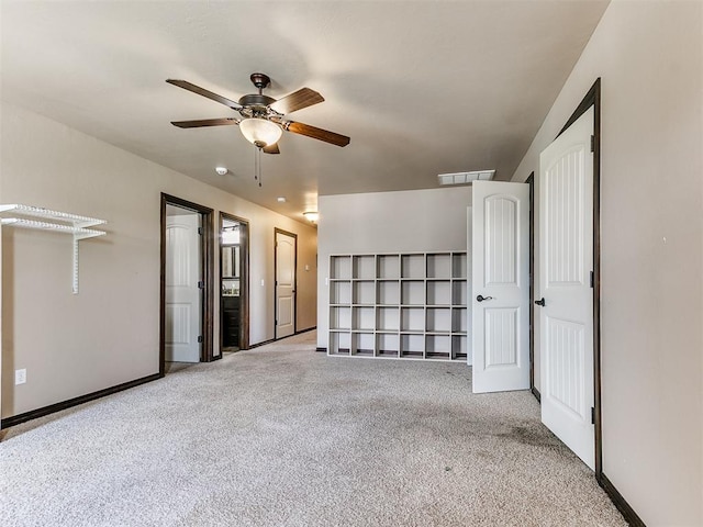 15228 Turtle Lake Pl, Oklahoma City, OK 73165 - unfurnished bedroom with carpet floors, baseboards, and a ceiling fan