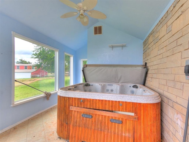 4355 S Midwest Blvd, Guthrie, OK 73044 - sunroom featuring a hot tub, lofted ceiling, and ceiling fan
