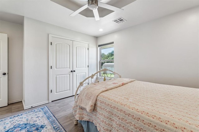 1783 Classic Run, Guthrie, OK 73034 - bedroom featuring wood finished floors, a closet, baseboards, ceiling fan, and recessed lighting