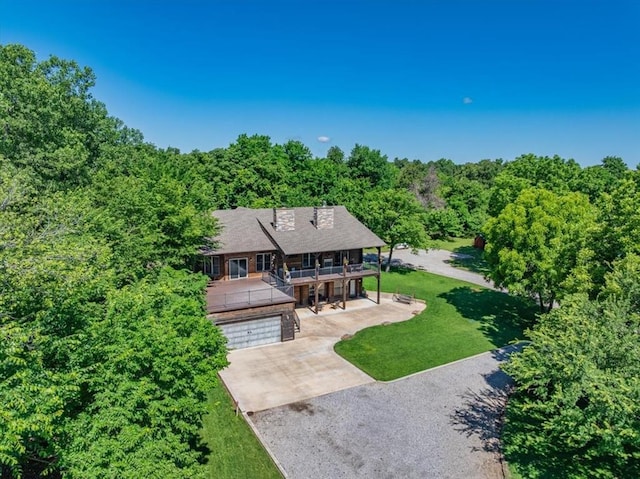 2801 John Deere Ave Unit 1, Edmond, OK 73034 - view of subject property featuring a forest