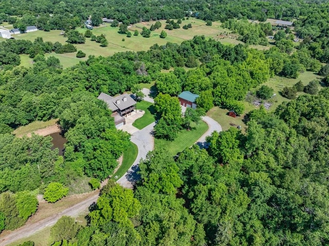 2801 John Deere Ave Unit 1, Edmond, OK 73034 - view of property location featuring a forest