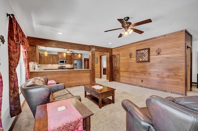 2801 John Deere Ave Unit 1, Edmond, OK 73034 - living area with a ceiling fan, light colored carpet, wood walls, and recessed lighting