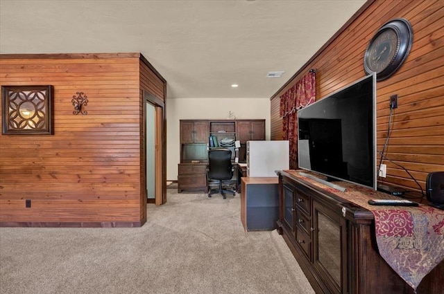 2801 John Deere Ave Unit 1, Edmond, OK 73034 - home office featuring wooden walls and light colored carpet