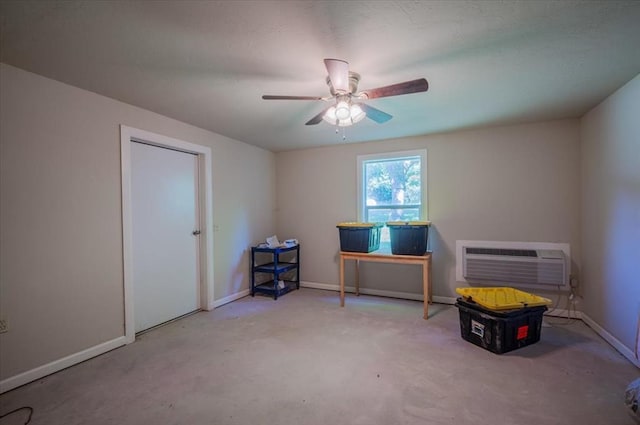 2801 John Deere Ave Unit 1, Edmond, OK 73034 - misc room with a wall mounted air conditioner, carpet floors, baseboards, and ceiling fan